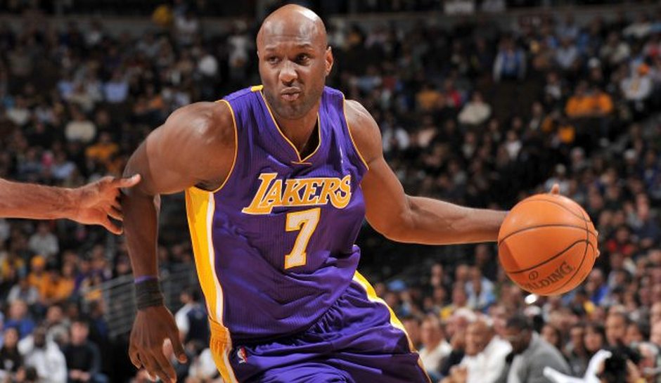 DENVER, CO - NOVEMBER 11: Lamar Odom #7 of the Los Angeles Lakers moves the ball against the Denver Nuggets on November 11, 2010 at the Pepsi Center in Denver, Colorado. NOTE TO USER: User expressly acknowledges and agrees that, by downloading and/or using this Photograph, user is consenting to the terms and conditions of the Getty Images License Agreement. Mandatory Copyright Notice: Copyright 2010 NBAE (Photo by Garrett W. Ellwood/NBAE via Getty Images)